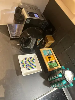 a close up of a lego controller next to a toilet at My Haus European Commision in Brussels