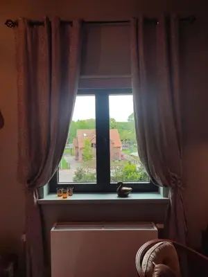 a window with a view of a house at Dilectus (Via Caput) in Lokeren