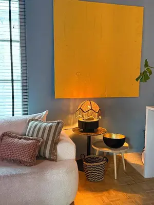 a living room with a couch and a table at Kleurrijke nieuwe woonst in hartje Antwerpen in Antwerp
