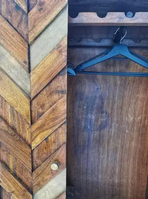 a wooden door with a hanger on it at Cosy apartement in Antwerp's hipster neighbourhood in Antwerp