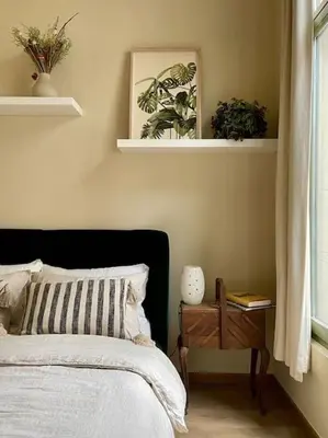 a bedroom with a bed and a window with plants at Stunning apartment by MAS in Antwerp