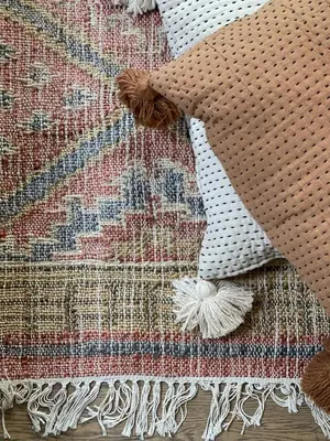 a close up of a rug with a tie on it at Stunning apartment by MAS in Antwerp