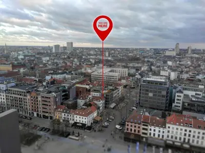 a red heart balloon in the middle of a city at Stunning apartment by MAS in Antwerp