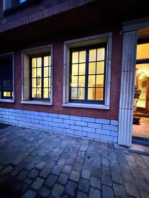 a house with windows on the side of it at CES Home in Ghent