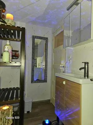 a kitchen with a blue ceiling with a sink at Love Zen Room Atomium et Palais de l'exposition in Brussels