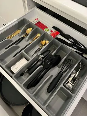 a tray with utensils in a drawer at Studio à Ixelles - Viaduc in Brussels