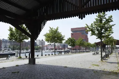 a view of a street with trees and a building at Dock 29 in Antwerp