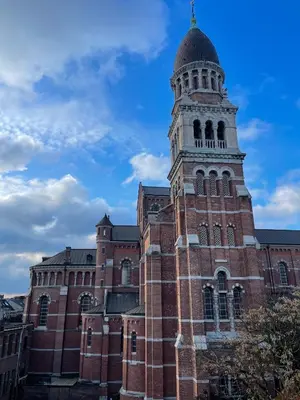 a building with a tower on top of it at Stay in Artist’s Gallery in Antwerp