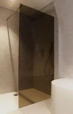 a shower with a glass door in a bathroom at The View in Antwerp
