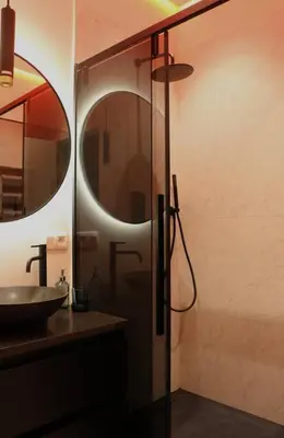 a bathroom with a sink and a mirror at The View in Antwerp