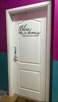 a white door with a sign that reads bless its humans and all who enter at Modern & Comfortable City Center Oasis~King Bed ! in Brussels