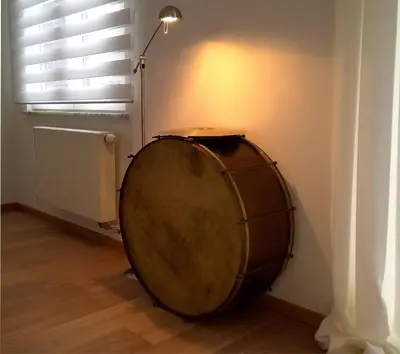 a wooden drum in a corner of a room at Almost White, Near Train, Metro n7688 in Brussels