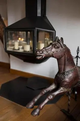 a statue of a horse next to a lamp at Chic Penthouse Grand-Place in Brussels