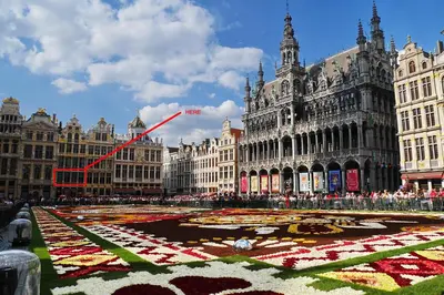 a large building with a flower pattern on the ground at Unique Flat on the GRAND PLACE in Brussels