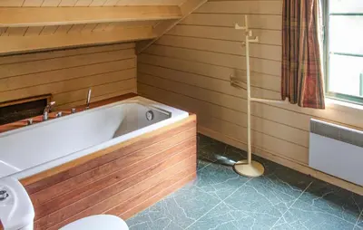a bathroom with a bath tub in a room at 2 Bedroom Cozy Home In Arendonk in Arendonk