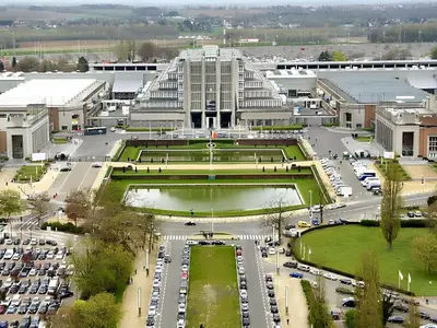 an aerial view of a parking lot in front of a building at Modern Apartment in Molenbeek-Saint-Jean / 77 m² / Parking in Brussels
