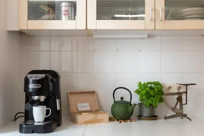 a coffee maker on a counter in a kitchen at Saint Catherine Art Residence in Brussels
