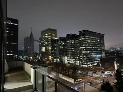 a view of a city at night with buildings at Penthouse Apartment in Brussels with Stunning View in Brussels