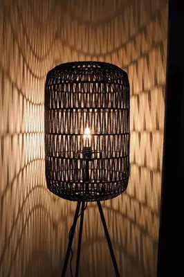 a wicker lamp in front of a brick wall at Luxury 2 Bedroom - Antwerp City Centre in Antwerp