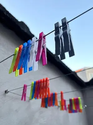 a bunch of clothes hanging on a clothes line at Agelandkaai (.be) Free Parking in Ghent