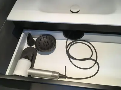 a desk with a pen and a phone on it at Agelandkaai (.be) Free Parking in Ghent