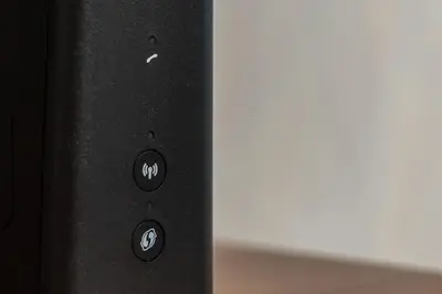 a close up of a black remote control at luxueux appartement 5 chambre in Brussels