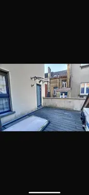 a view of a building with a swimming pool at Le Havre de Lumière à Etterbeek in Brussels