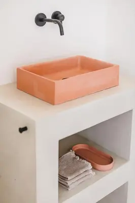 a sink on top of a white shelf with towels at Your colourful Antwerp Oasis in Antwerp