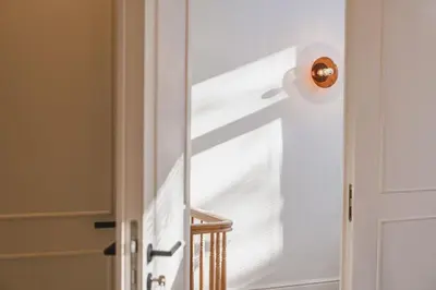 a glass door with a door knob on it at Your colourful Antwerp Oasis in Antwerp
