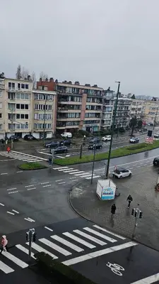 an intersection with a crosswalk in a city with buildings at Luxurious 3 in Brussels