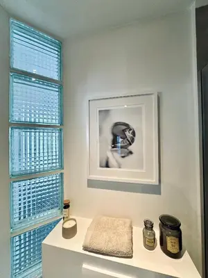 a bathroom with a sink and a window at Magnifique appartement au coeur du SABLON ! in Brussels