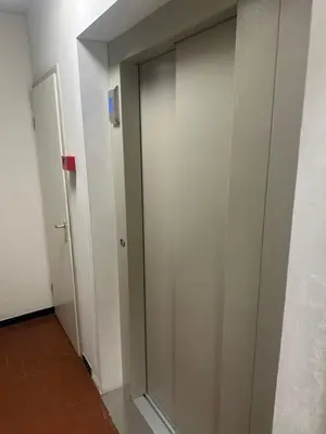 a sliding glass door in a hallway at Résidence Europe in Brussels