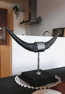 a statue of a horn on a table at Diamond - room with a view in Antwerp