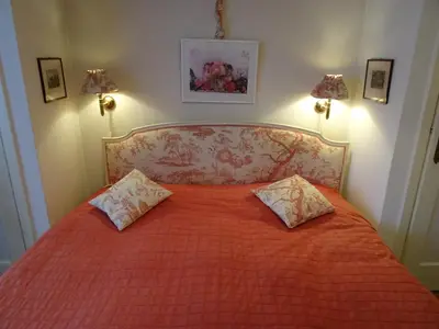 a bedroom with a bed with two pillows on it at B&B Capitaine Piret in Brussels
