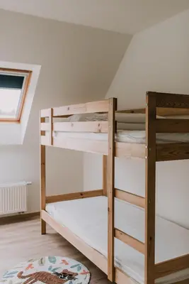 a pair of bunk beds in a room at Vakantiehuis De Bekaf in Stekene