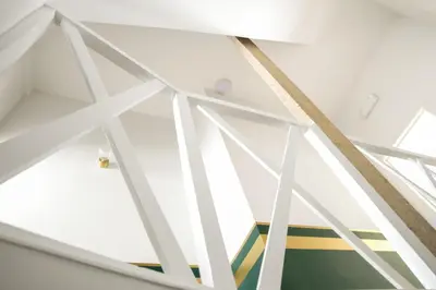 a view from the top of a room with white ceilings at WoW in Brussels