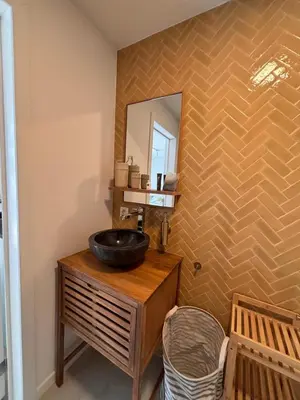 a bathroom with a sink and a mirror at Business Accommodation 'Scandinavian Living' Nomad in Geel