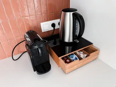 a coffee maker on a counter next to a coffeemaker at Business Accommodation 'Flow Living' Nomad in Geel