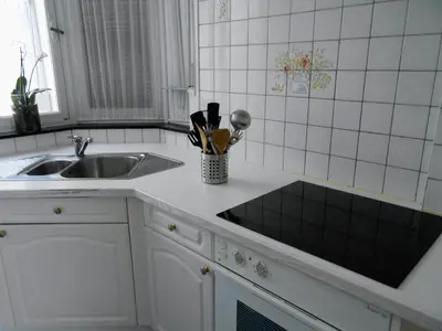 a kitchen with a sink and a counter top at VILLA EXPO in Brussels