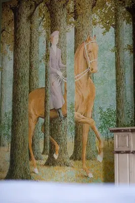 a painting of a person riding a horse in the woods at Atelier K - Art Guesthouse in Brussels in Brussels