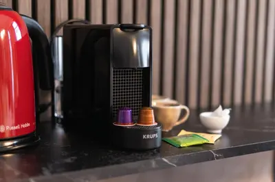 a coffee maker sitting on top of a counter at Spacious Shared 5BR Apt in the Heart of Gent in Ghent