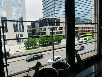 a view of a city street from a window at Jardin Botanique in Brussels