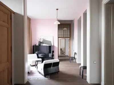 a living room with a couch and a chair at CE RESIDENCE 2 in Ghent