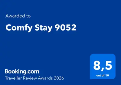 a screenshot of a cell phone screen with a blue at Comfy Stay 9052 in Ghent