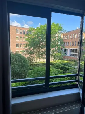 an open window with a view of a building at Coeur de Bruxelles, Grand-Place et Mannekenpiss in Brussels