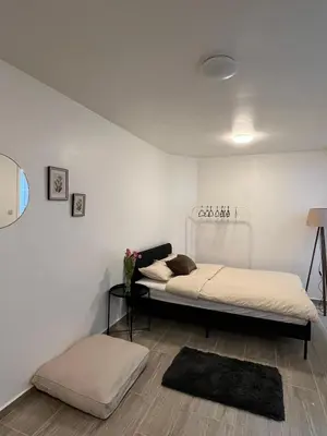 a bedroom with two beds in a room at Rue blaes Appartement in Brussels