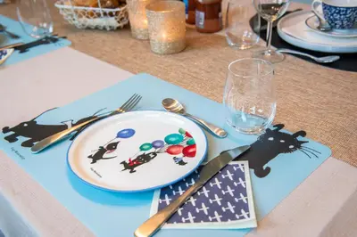 a table with a plate of food on top of a table at B&B Art'Aviation in Beauvechain