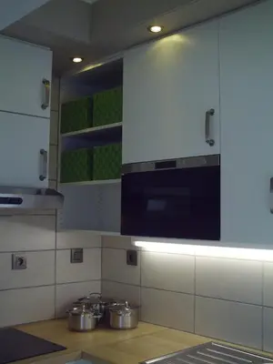 a kitchen with pots and pans on the counter at Apartment Capitalcondos in Ninove