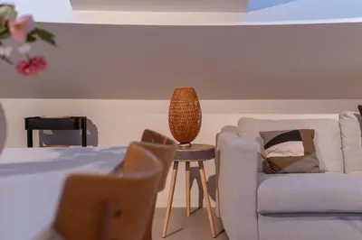 a living room with a couch and a chair at FLAX ANTWERP in Antwerp