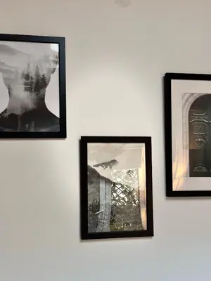 a group of pictures hanging on a wall at Studio n3 Bruxelles Centre Ville in Brussels
